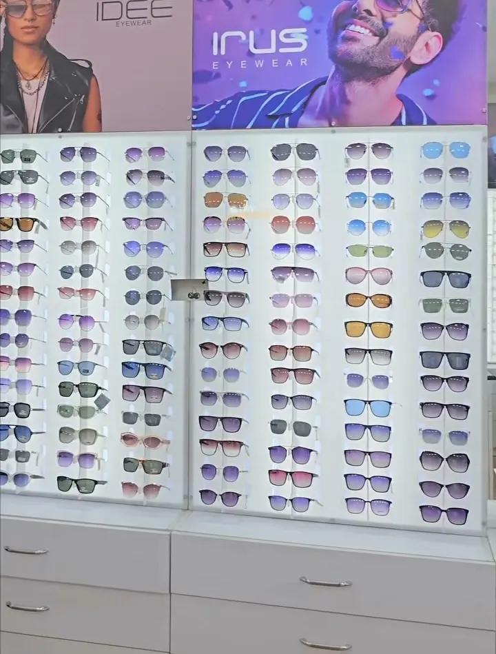 Sunglass wall with Idee and Irus displays at Optimax Vision